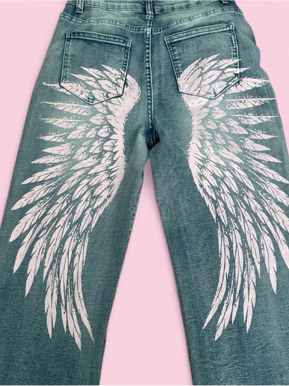 urban weekend blue mid rise jeans with light pink angel wings